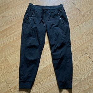 Athleta Black Track Pants with Tapered Fit and Elastic Cuffs